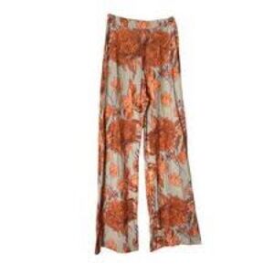 NWT- PrettyLittleThing orange floral print wide-leg pants.